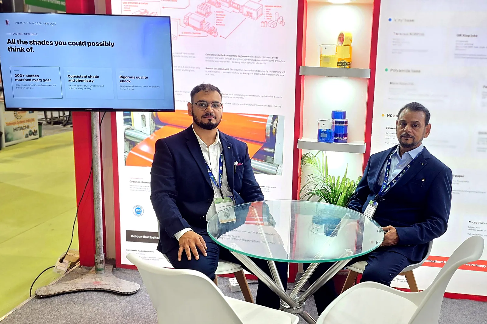 Mayank Saxena and Nalneesh Saxena at the Polychem Stand A103, PackPlus 2026, Pragati Maidan, Delhi